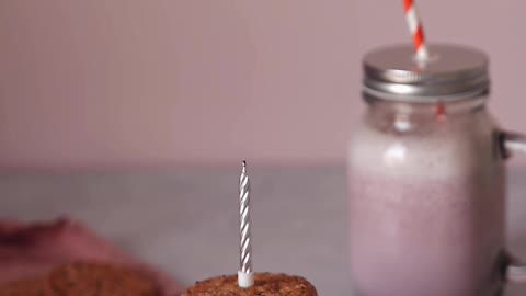 Lighting a Candle on Top of the Cookie Sandwich