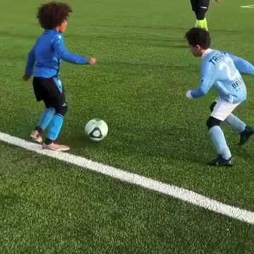 Young Talent on Display: Impressive Kids' Football Skills! #football