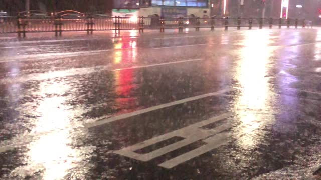 Heavy rain on bus stop