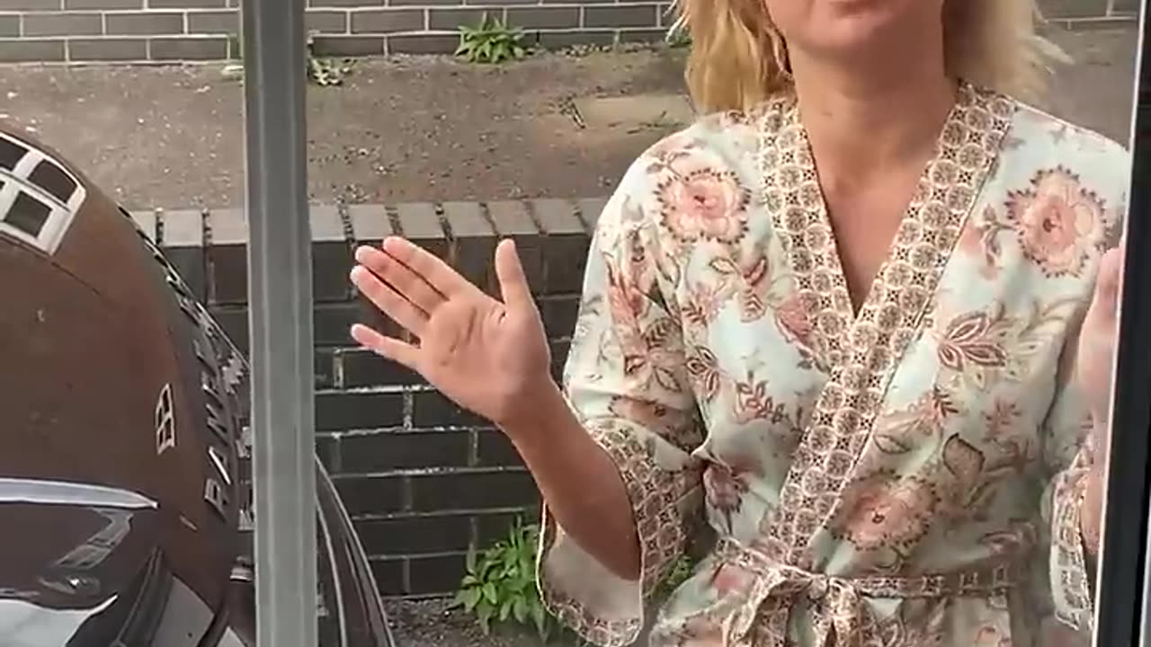 Karen climbed into his front yard