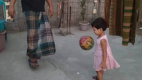 Father & Daughter Playing Football