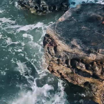 Ocean Waves Crashing On Rocks