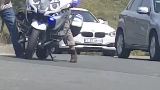 Cop Struggles to Mount Motorcycle