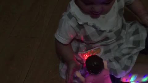 Cutest baby enjoy playing with her toy