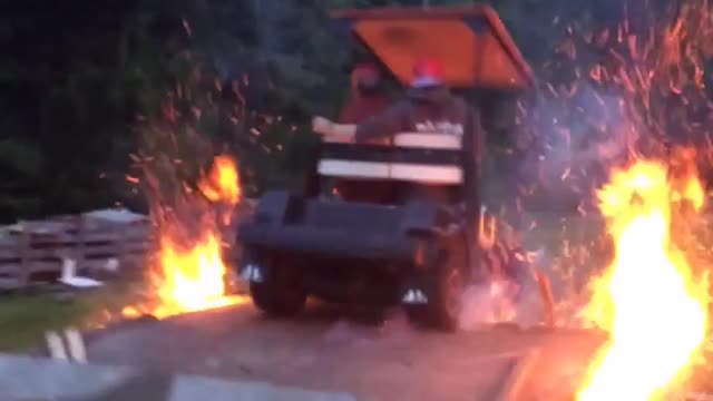 Golf cart ride flaming ramp