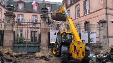 French farmers are back at it dumping garbage over the walls of government buildings