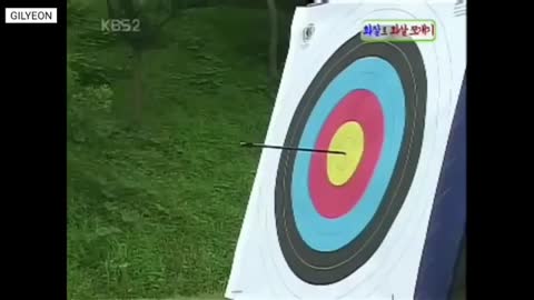 With the bow directly at the target in the middle