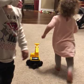 Adorable toddlers showing their love for each other