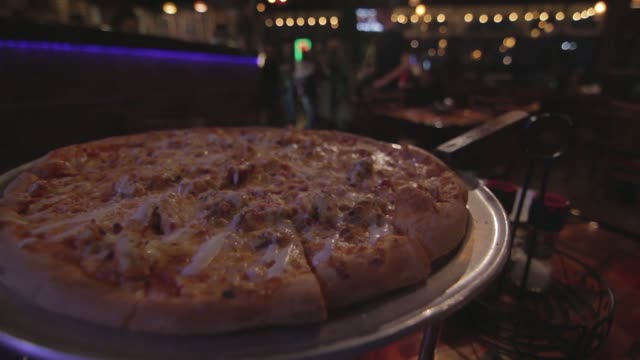 Seasoning Pizza at Italian Restaurant