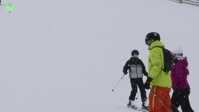 skiers descend on a hd