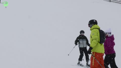 skiers descend on a hd