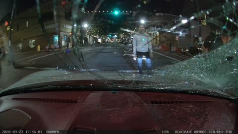 Skateboarder Smashes Windshield