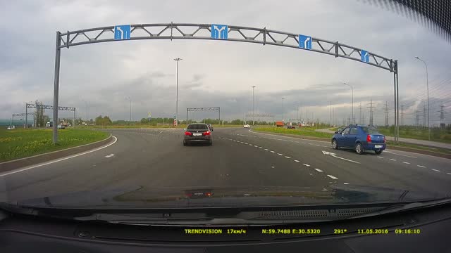 Car Flies Across Highway into Grass