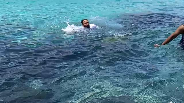 Swimming in beach