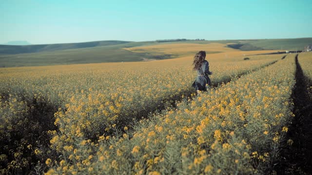 Girl running in the field