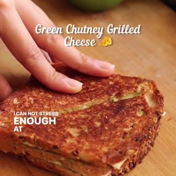 "A Tangy Twist: Grilled Cheese with Green Chutney Delight!"