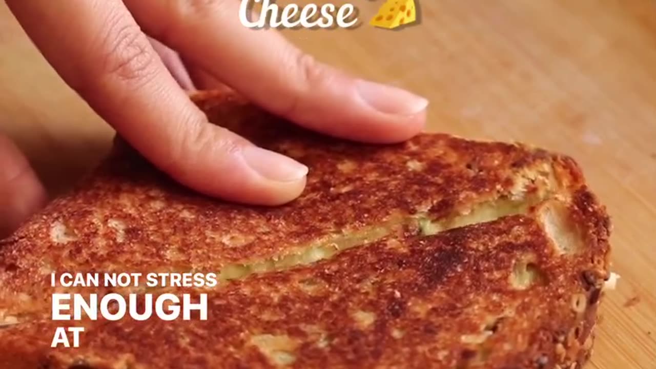 "A Tangy Twist: Grilled Cheese with Green Chutney Delight!"