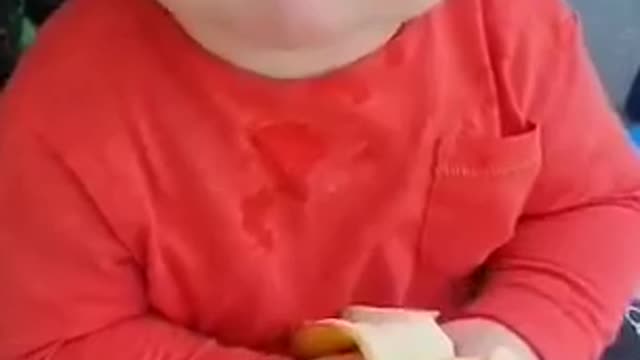 The child eats bananas