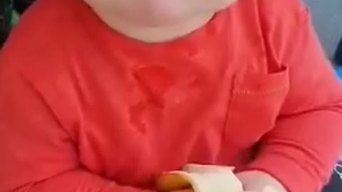 The child eats bananas