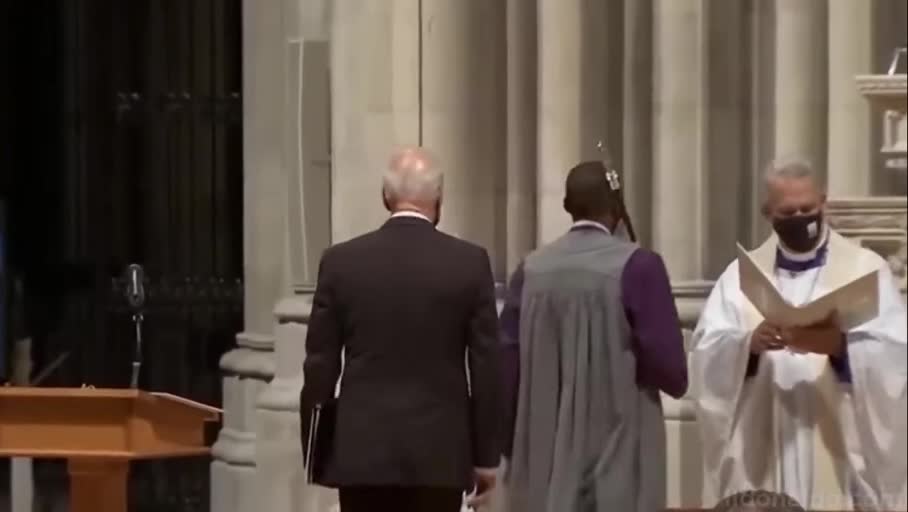 Joe Biden walks to Podium in Church