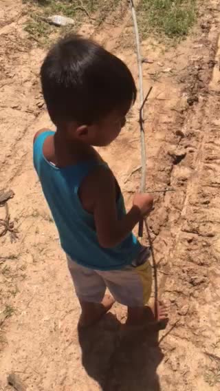 Playing boy walking to field