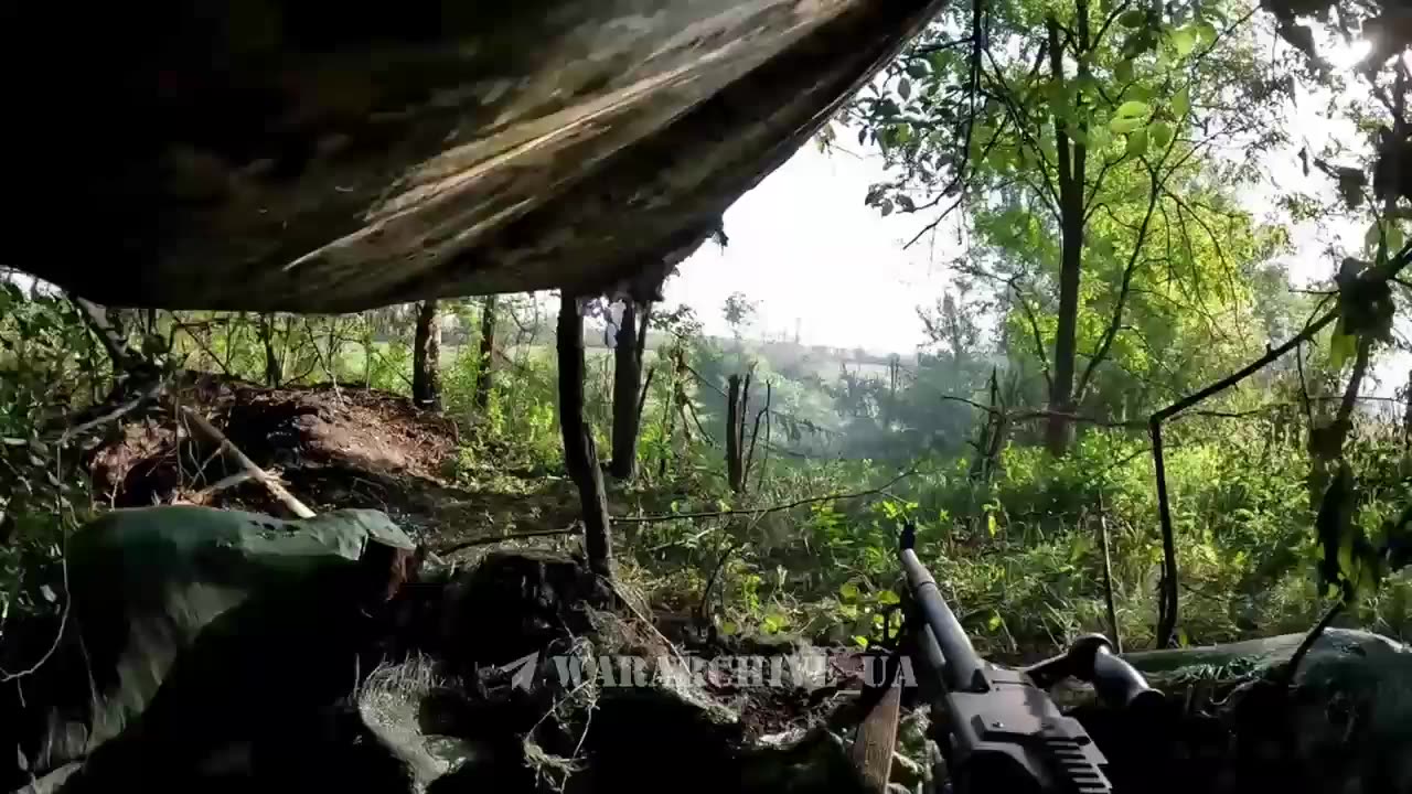 Soldier operating a machine gun against Russian troops movements