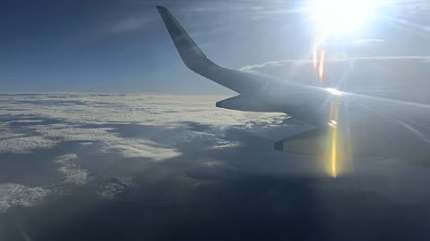 Airplane day view. Airplane on the cloud