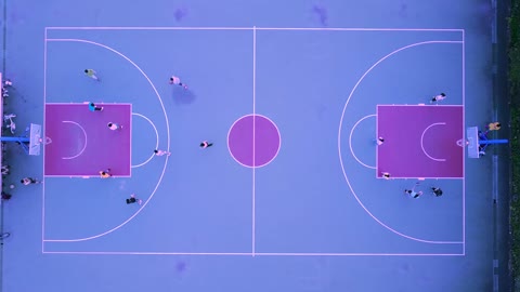 Aerial view of a blue and purple basketball court