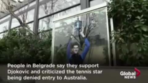 Novak Djokovic supporters protest against the Australian
