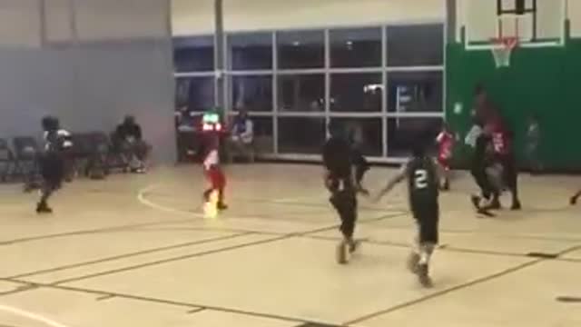 Kid gets his shot blocked by his own coach