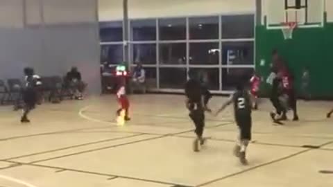 Kid gets his shot blocked by his own coach