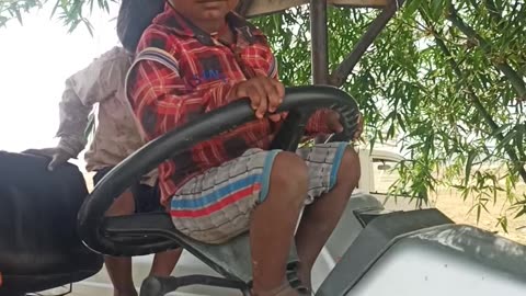 Kid drive tractor