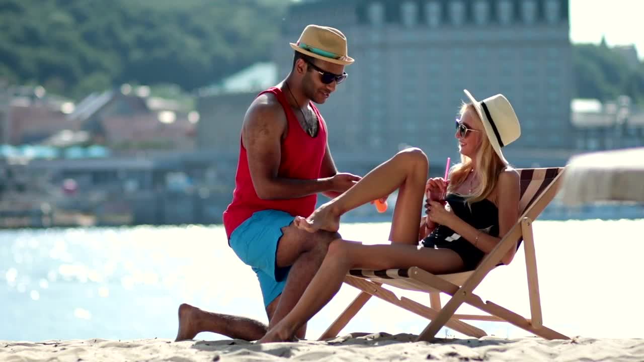 Man applying sunscreen
