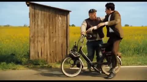 Mr Bean's holiday-Mr Bean and man with motorbike