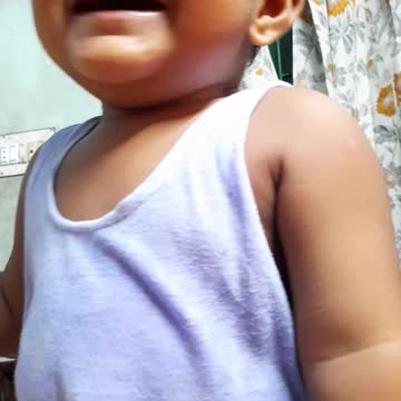 baby boy laughing & playing