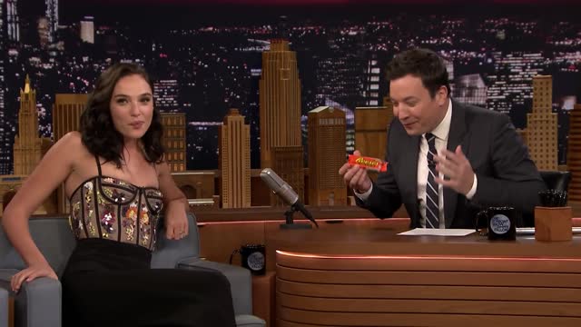 Gal Gadot Tries a Reese_s Peanut Butter Cup for the First Time