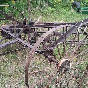 JD 594 Steel Wheel 4 Bar Side Delivery Rake