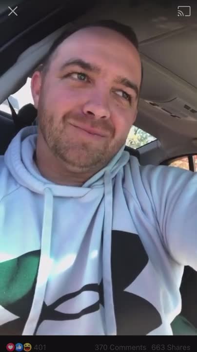 Trump supporter about to pop "Baby Trump" balloon