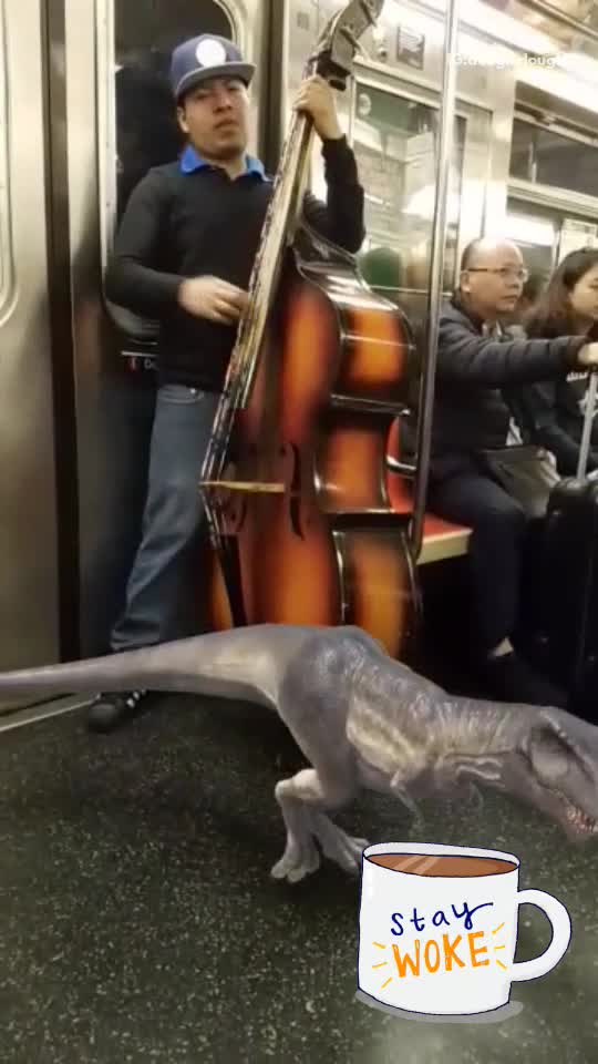 Guy playing cello giant violin subway trex snapchat filter