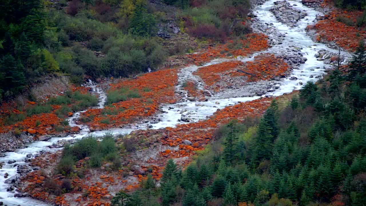 Bright red rocks under the glacier