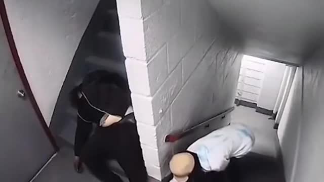Warning disturbing: video shows homeless man set on fire in a stairwell