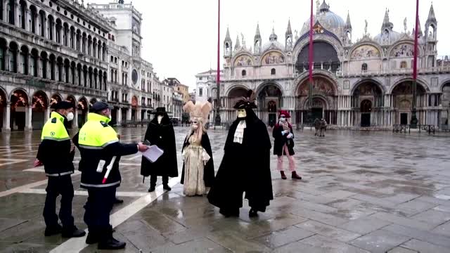 Cancelled Venice carnival marked by masked revellers