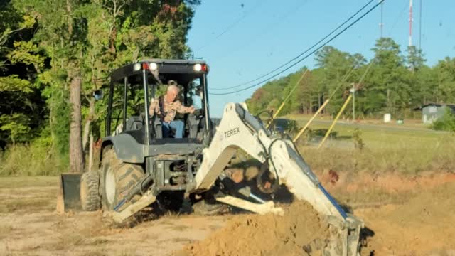 Pawpaw on backhoe 102722