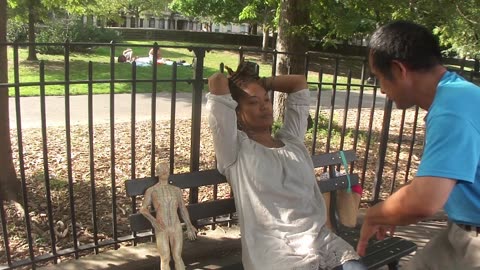 Luodong Massages African Woman At Playground