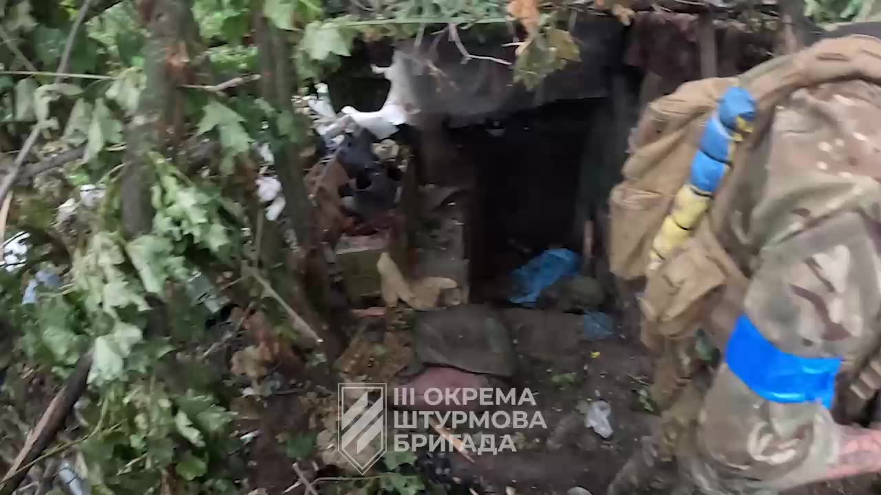 Ukrainians Search a Russian Dugout