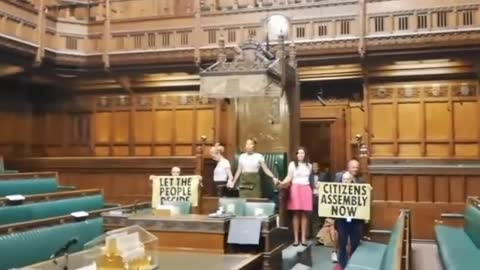 Extinction Rebellion superglue themselves onto the Speaker’s Chair in the UK House of Commons