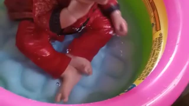 Cute baby play with water