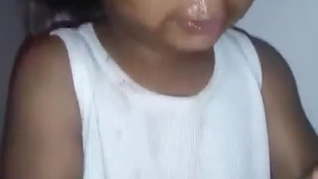 Granddaughter puts hair grease all over her face