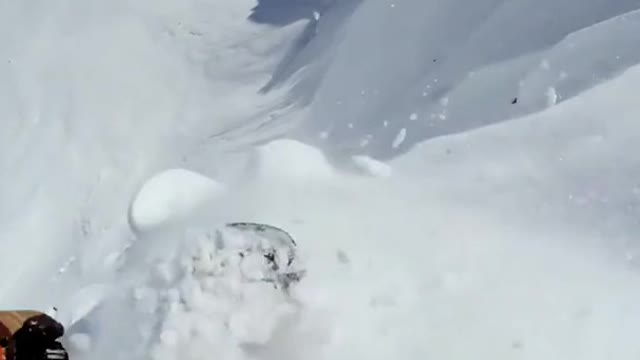 Sliding down a near-vertical snow mountain