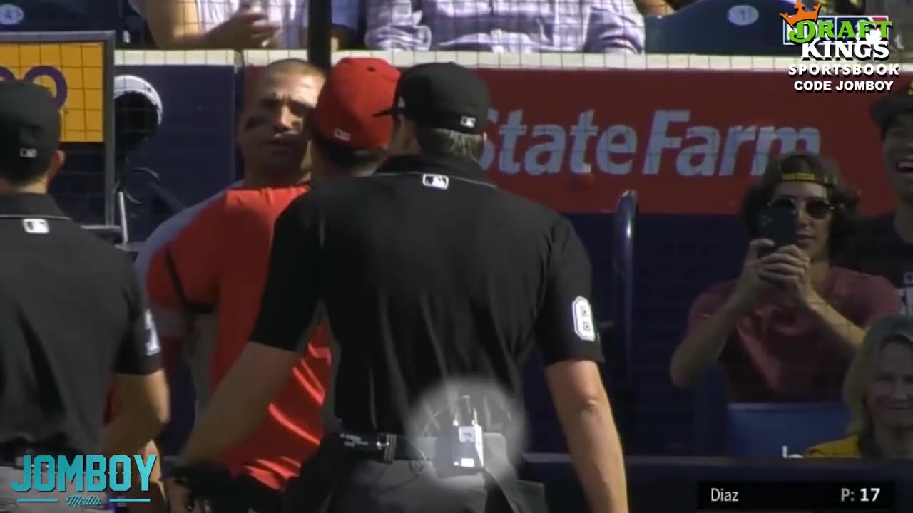 Joey Votto, his manager, and a fan get ejected in the 1st, a breakdown